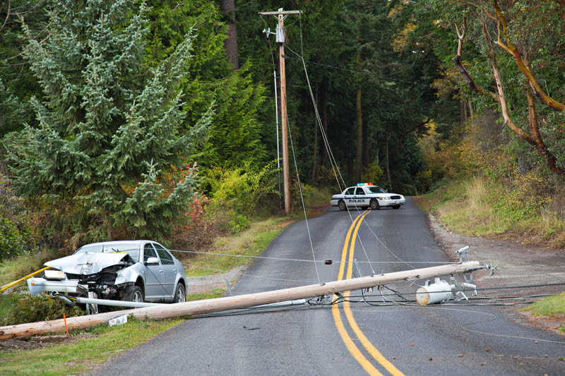 a car crashed into a telephone pole